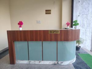 a lobby with a sign that reads hospital at Hotel Udaan Stay in Jaipur