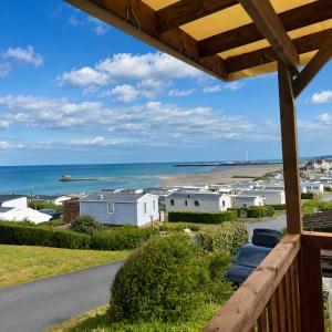 a view of the ocean from the porch of a house at Blueportel Horizon L40 in Le Portel