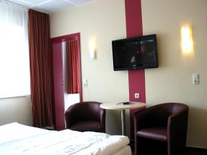 TV a/nebo společenská místnost v ubytování Panorama Hotel Bansin
