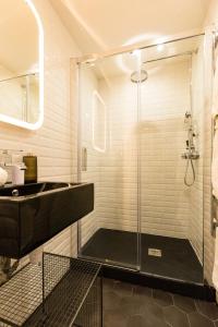 a bathroom with a shower and a sink at Moulin -Old Town in Nice