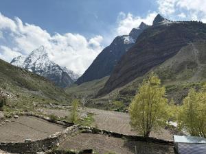 a view of a mountain with a road and mountains at Hotel Devachan & Restaurant in Tāndi