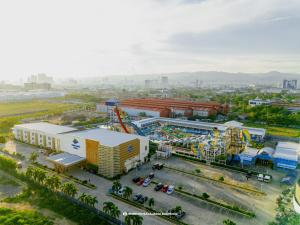 an aerial view of an amusement park with a roller coaster at Waterworld Hotel Cebu in Mandaue City