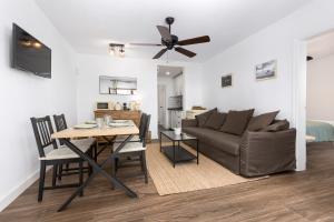 a living room with a couch and a table at Casa Nube in Corralejo