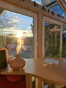 a table in front of a window with a view at Beates Daham in Fohnsdorf