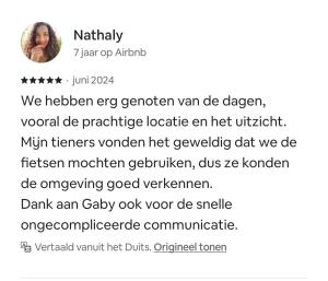 a screenshot of a cell phone of a woman at Stacaravan met schitterend uitzicht over het meer, in Friesland! Op de 5-sterren Camping de Kuilart met Zwembad! in Koudum
