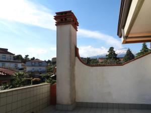 a column on a wall with a view at Villa Ara Dell'Etna in Pedara