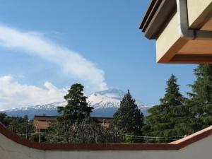 a view of a snow covered mountain from a building at Villa Ara Dell'Etna in Pedara