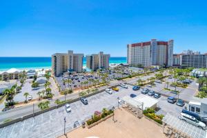 an aerial view of a parking lot in front of the beach at Laketown Wharf 903 in Panama City Beach