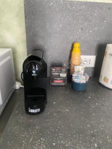 a coffee maker sitting on top of a counter at B&B Il Viale in Ponte dellʼOlio