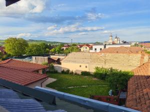 a view of a city from the roof of a building at Sleep&Go Airport Transit Rooms Cluj-Napoca in Cluj-Napoca