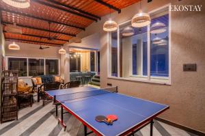 a ping pong room with a ping pong table at EKOSTAY - Casa Elara in Igatpuri +24 photos