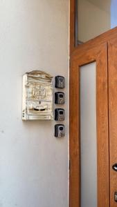 a toaster on a wall next to a door at Negru Voda 9- Old Town in Constanţa +21 photos