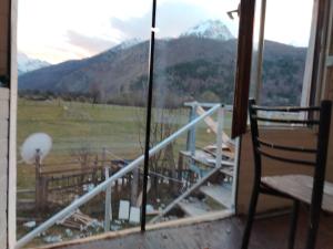 a balcony with a view of a mountain at Artani selimi in Valbonë