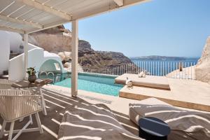 a villa with a view of the ocean at Lilium Hotel Santorini in Fira