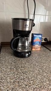 a coffee maker sitting on top of a counter at El Balcón de Gredos in Candeleda