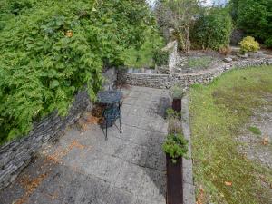 an overhead view of a table in a garden at Old Chapel Apartment in Kendal