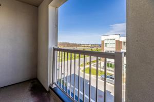 a balcony with a view of a street at spacious 3 bedroom space in Markham