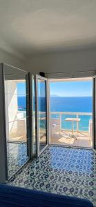 a room with a view of the ocean at La Dimora sul Mare in Sant'Angelo D'Ischia