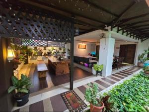 an open living room and dining room of a house at Aika Homestay in Shah Alam