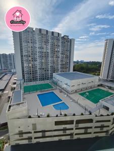 a view of a large building with a basketball court at RAF Homestay Seri Serindit in Malacca