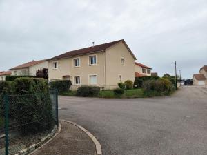 a house on the side of a street at L'Orée du Bois in Pulnoy