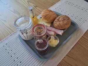 a plate of food with different types of food on a table at B&B De Zeeaster in Kimswerd