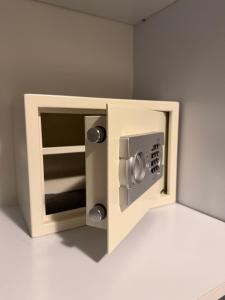 a microwave oven in a corner of a room at Pool View Private Apartment in Vlorë
