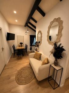 a living room with a couch and a table at Sea house Lea in Novi Vinodolski