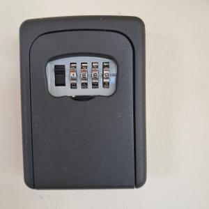a black electronic device with thirteen buttons on it at AZUL PUERTO Del MALECON in San Felipe de Puerto Plata