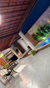 a room with a table and chairs in a room at Casa Sol e mar in Tibau