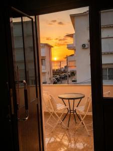a view of a balcony with a table and chairs at Sea Hotel in Ksamil