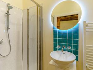 a bathroom with a sink and a shower at 2 Bed in Usk- oc-87285 in Llandenny +10 photos