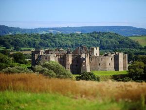 a castle in the middle of a field at 2 Bed in Usk- oc-87285 in Llandenny