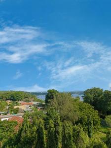 a view of trees and a body of water at Meyer Stays in Kilifi