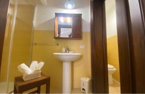 a bathroom with a sink and a shower and a toilet at Il Moro di Ossuna in Trapani +21 photos