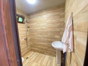 a small bathroom with a sink and a toilet at SUNSET BUKNARI in Buknari +27 photos