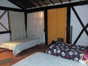 Voodi või voodid majutusasutuse Tarragona Hostal toas