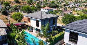 an aerial view of a house with a swimming pool at Villa Sunset in Marmaris
