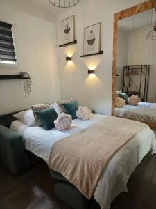 a bedroom with two beds with towels on them at *Ça me convient* Studio Chaleureux in Villejuif