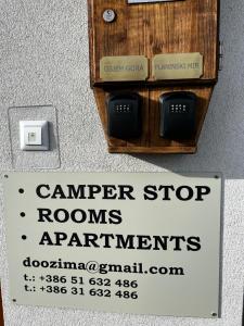 a sign that reads campper stop roomsagentsagentsagents at Rooms Zima in Žirovnica +16 photos