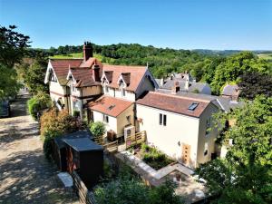 an aerial view of a house in a village at Hollins Lodge in Grosmont