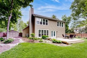 a house with a wooden deck and a yard at 'Heart Pond Resort' Home in Carmel-Westfield Area in Carmel
