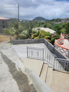 a skate park with a gate on a sidewalk at Prospect Loft in Kingstown