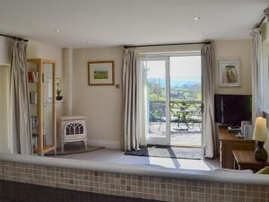 a living room with a view of a living room at Dewsnap Spring- Rtt4 in Chinley