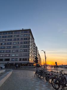 a group of bikes parked in front of a building at Appartement Esmeralda in Knokke-Heist