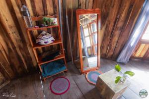 an overhead view of a room with a mirror and shelves at Iraboti Eco Resort Sundarban in Dhāngmāri Forest Office