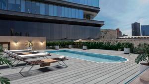 a patio with a swimming pool on a building at Casa Américas in Mexico City