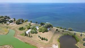 an aerial view of an island with a bridge over a body of water at The Majestic Oasis in Vineland Station