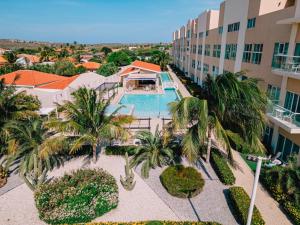 an aerial view of a resort with a swimming pool at Aruba Life 315 in Noord