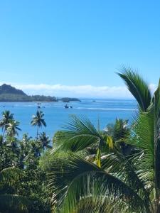 a view of the ocean from a resort at Sunrise Home in Savusavu
